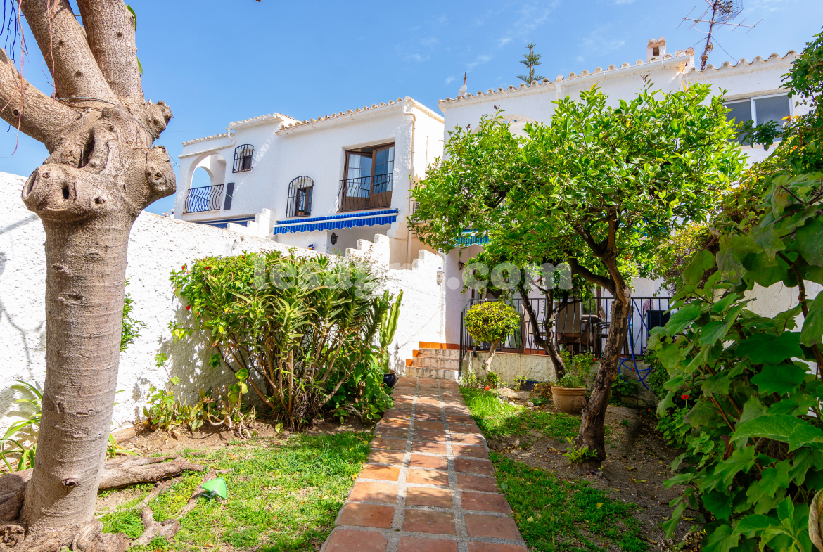 semi detached town house with garden in El Capistrano Village for sale