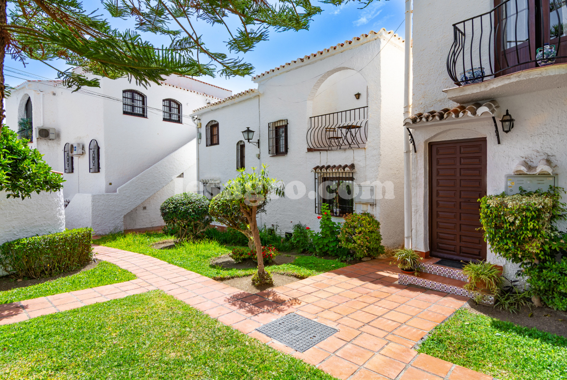 semi detached town house with garden in El Capistrano Village for sale