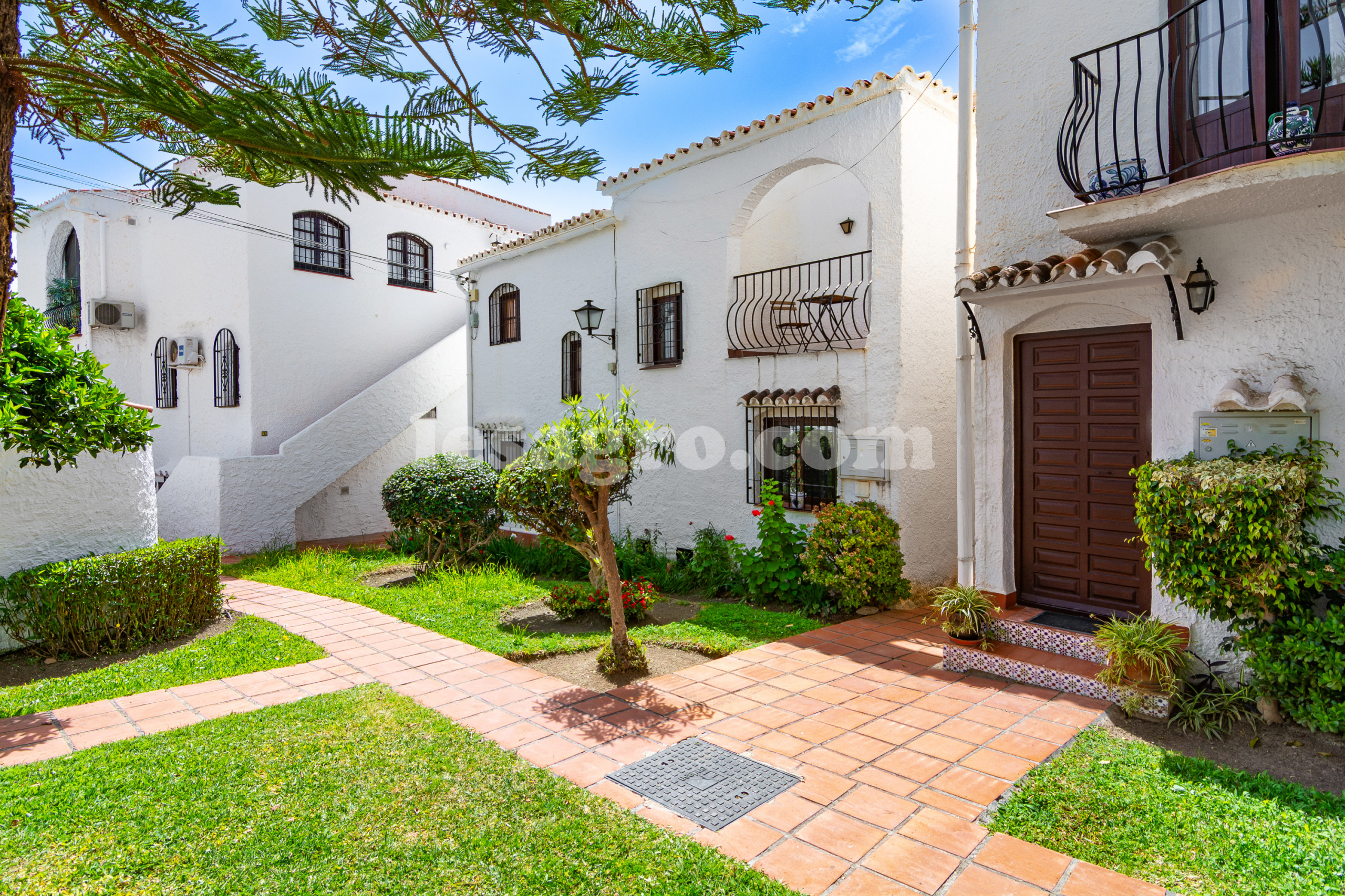 semi detached town house with garden in El Capistrano Village for sale