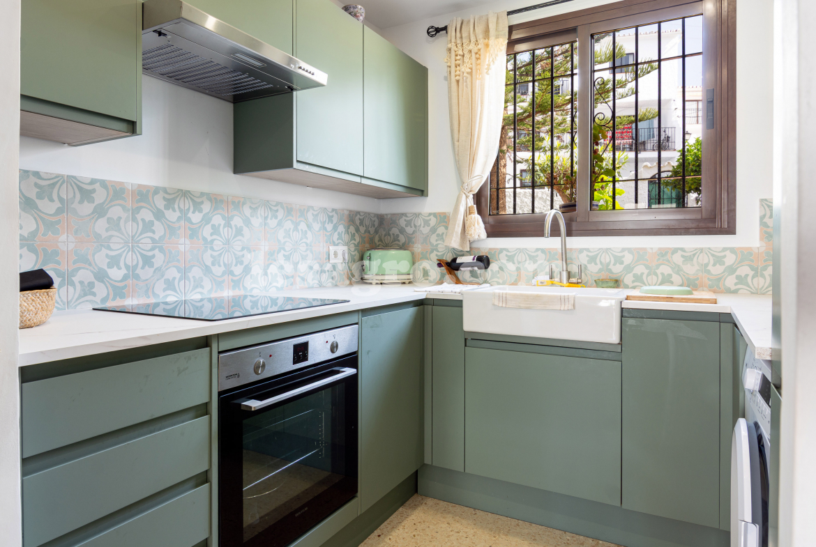 semi detached town house with garden in El Capistrano Village for sale