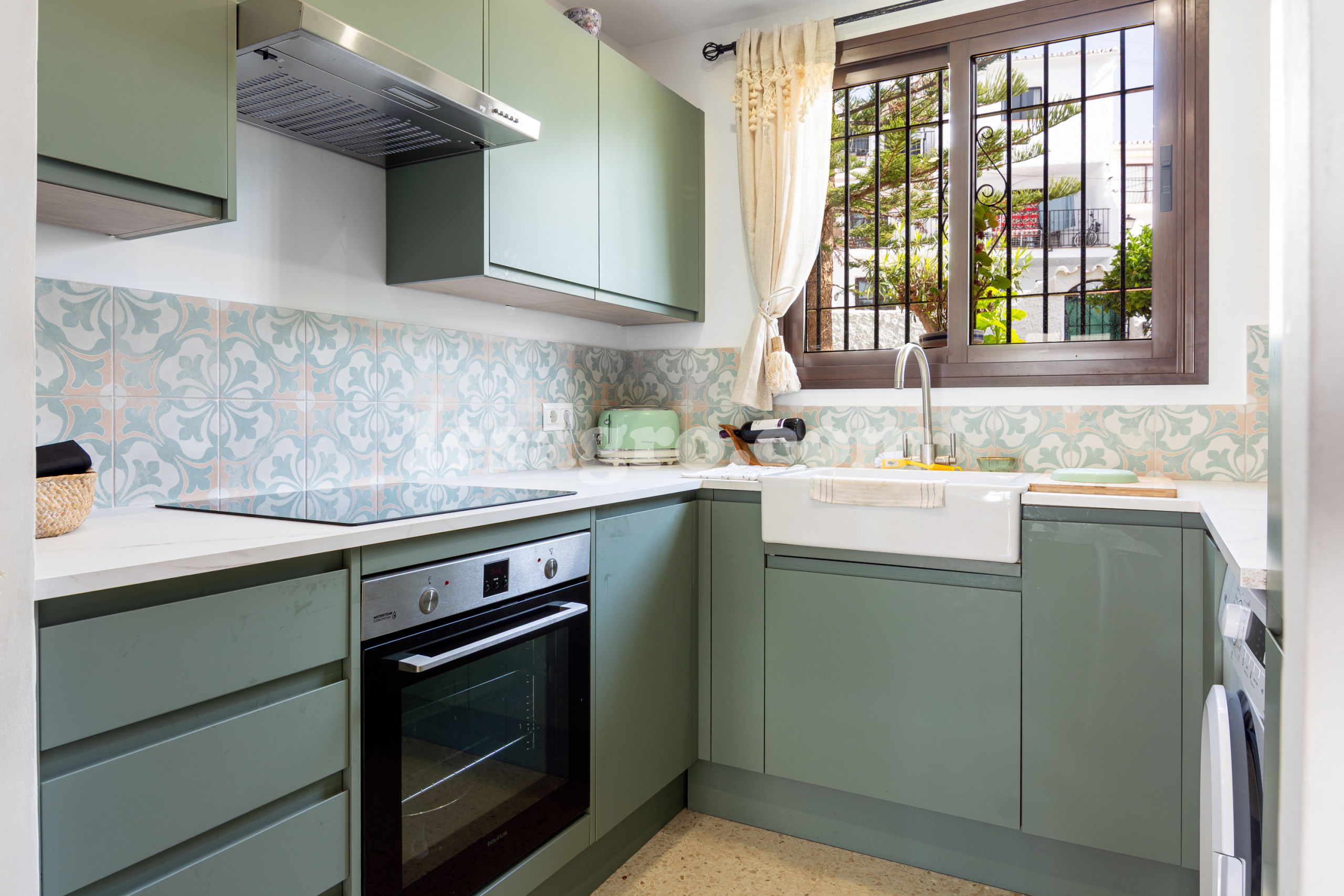 semi detached town house with garden in El Capistrano Village for sale