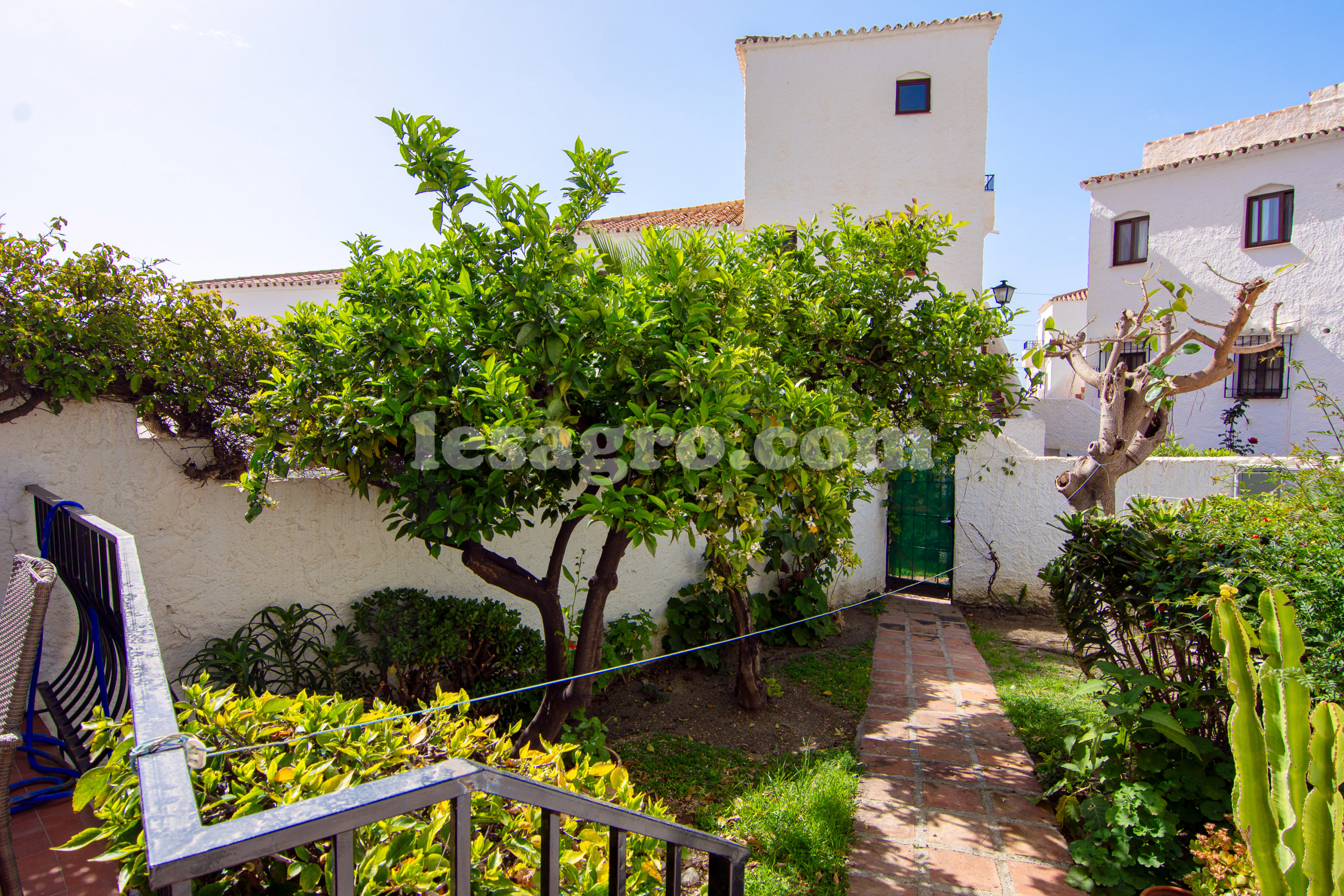 semi detached town house with garden in El Capistrano Village for sale